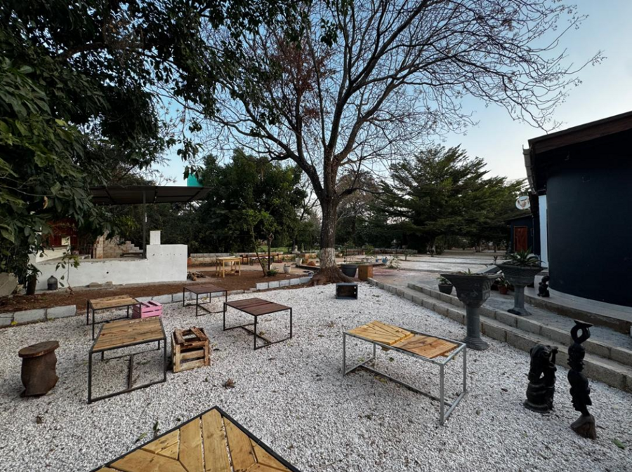 Outdoor braai and grill area with seating